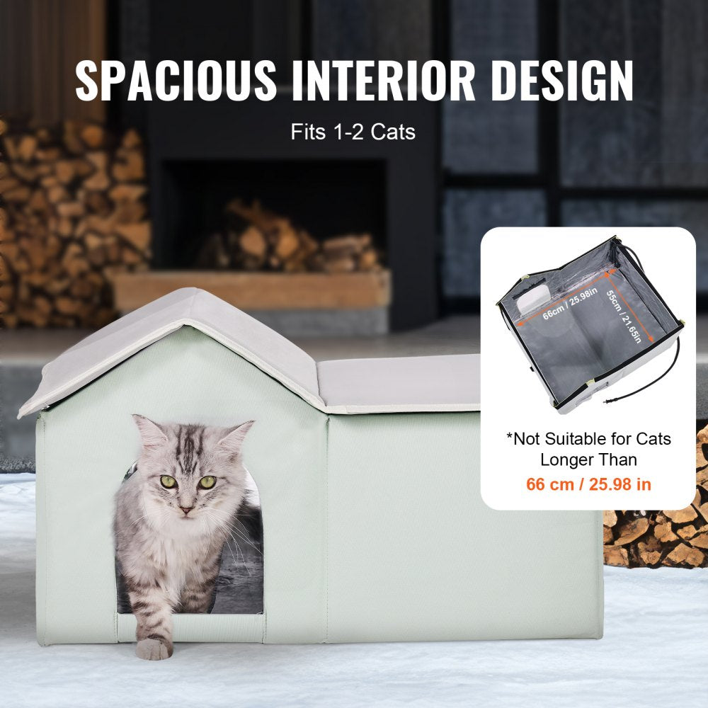 Green heated outdoor cat house with waterproof pad, dual exits, and insulated walls.