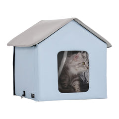 Blue heated cat house with a waterproof design and removable door for outdoor use.