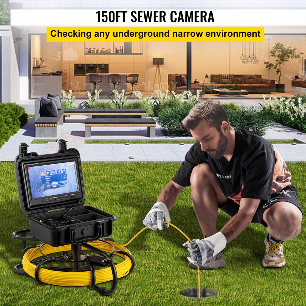 Man using 150ft sewer inspection camera with 9-inch monitor and waterproof cable in outdoor yard.