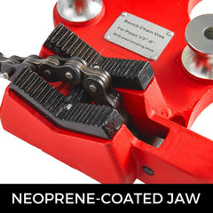 Red cast iron bench chain pipe vise with neoprene-coated jaws for 1/8-5 inch pipes.