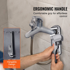 Hand using Bostome 18" aluminum pipe wrench tightening a faucet pipe against wall.
