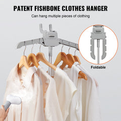 Bostome standing garment steamer with 0.5 gallon tank steaming white shirts on a hanger.