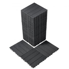 Dark grey interlocking deck tiles, 12"x12", made of durable plastic for outdoor or indoor use.