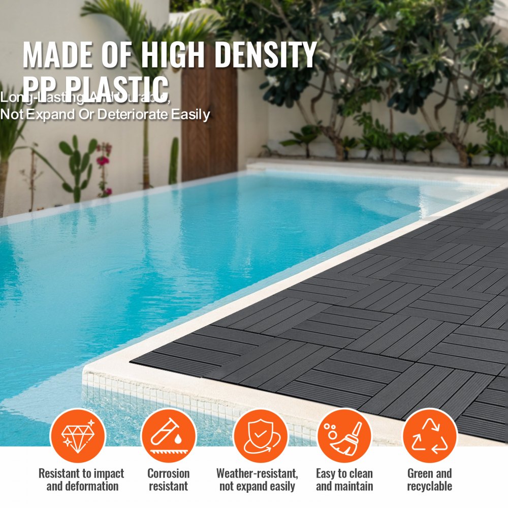 Dark grey interlocking deck tiles, 12"x12", made of durable plastic for outdoor or indoor use.