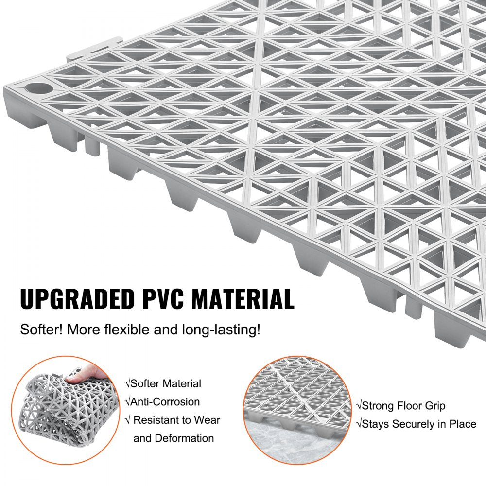 Gray PVC interlocking drainage tiles, 12"x12", designed for efficient water flow and slip prevention.