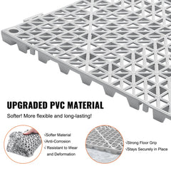 Gray PVC interlocking drainage tiles, 12"x12", designed for efficient water flow and slip prevention.