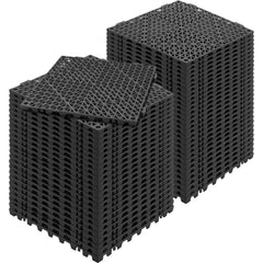 Stack of 55 black PVC interlocking drainage floor tiles, each 12x12 inches.