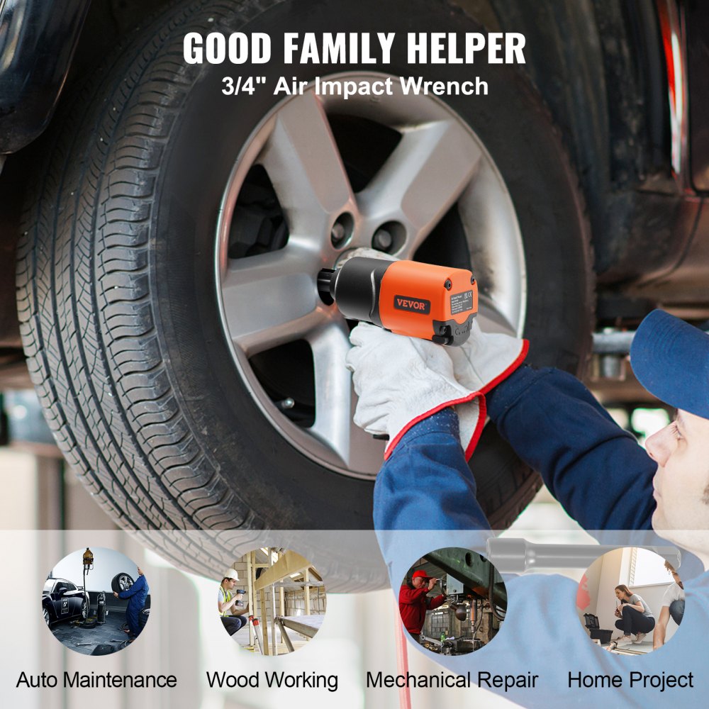 Orange 3/4" air impact wrench used by a mechanic to loosen lug nuts on a car wheel.