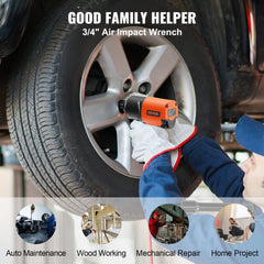 Orange 3/4" air impact wrench used by a mechanic to loosen lug nuts on a car wheel.