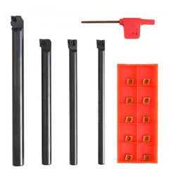Four 1/4-inch indexable lathe turning tool holders with tin-coated carbide inserts and a wrench.