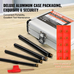 Four 1/4-inch indexable lathe turning tool holders with tin-coated carbide inserts in an aluminum case.