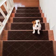 Brown non-slip stair treads installed on wooden steps, with a Jack Russell puppy sitting on one.