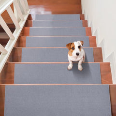 Gray non-slip stair treads in a 15-piece set, measuring 8"x30", for indoor use.