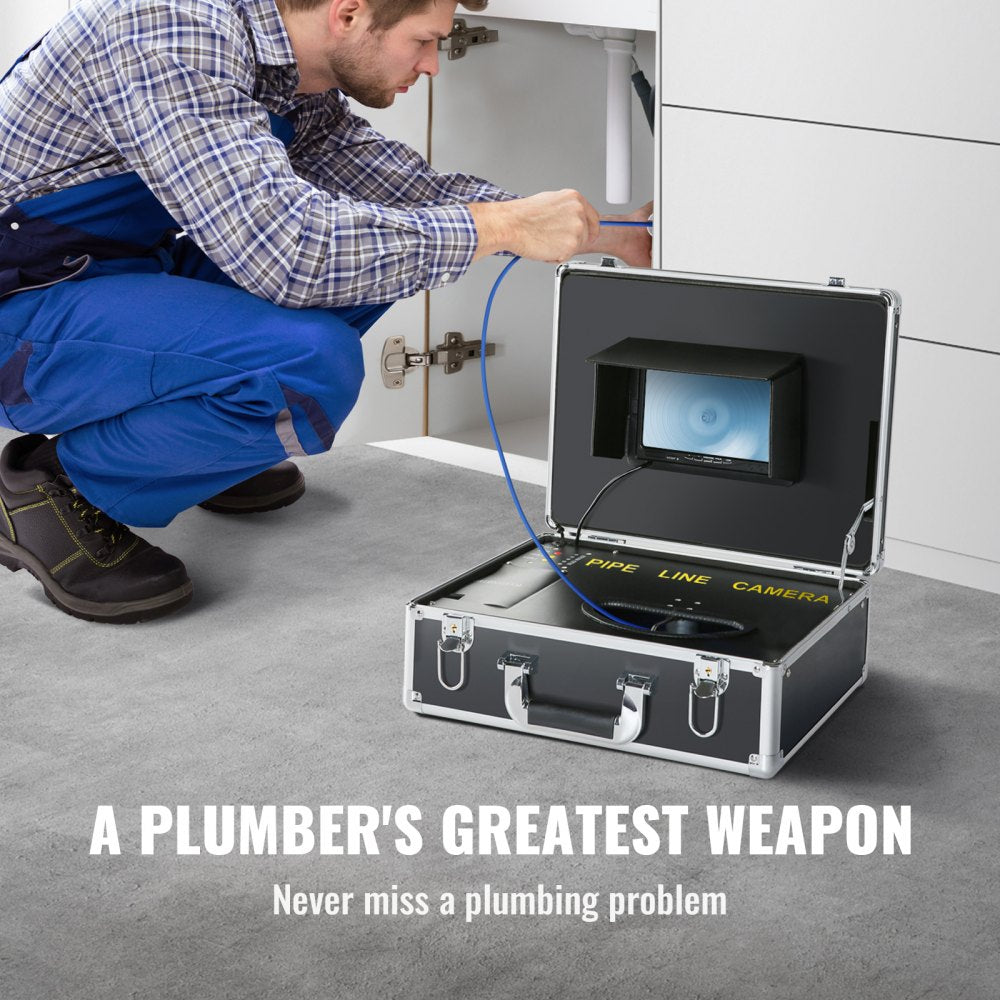 Plumber using Bostome sewer camera with 7-inch screen and open aluminum carrying case
