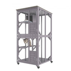 A three-tier gray wooden cat house with mesh walls and two cats inside.