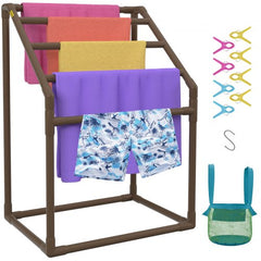 Brown PVC freestanding towel rack with 5 bars holding colorful towels, shorts, clips, hook, and mesh bag.