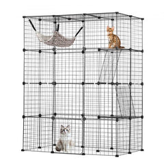 Large 4-tier metal wire cat cage with hammock, ramps, and two cats inside.