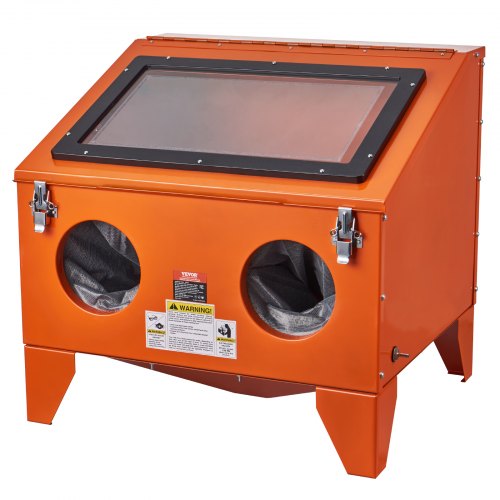 Orange steel sandblasting cabinet with two glove ports and a large angled viewing window.