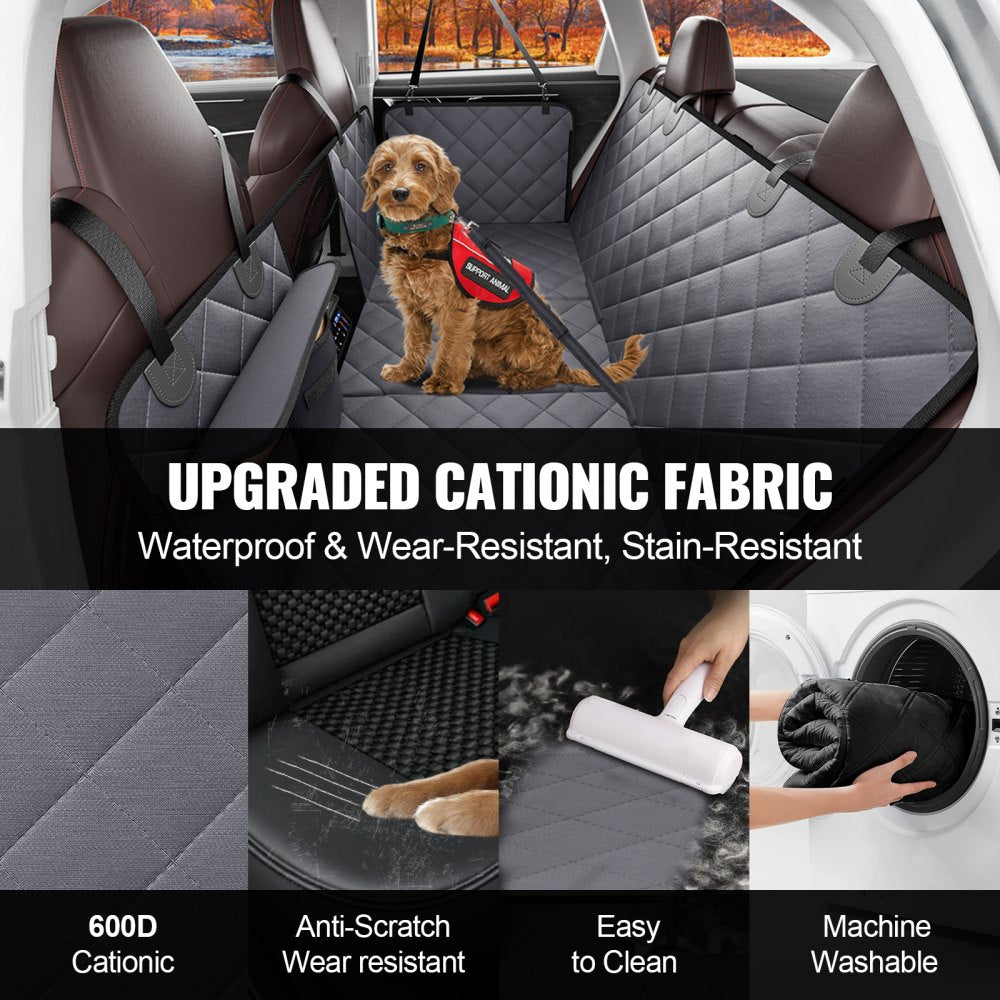 Gray waterproof 600D dog car seat cover installed on back seat with a small dog secured by harness.