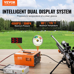 Orange Bostome 4500PSI PCP air compressor with dual display, connected to a rifle on a table.