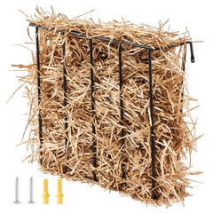 A black metal wall-mounted hay feeder filled with light brown hay, with mounting hardware.