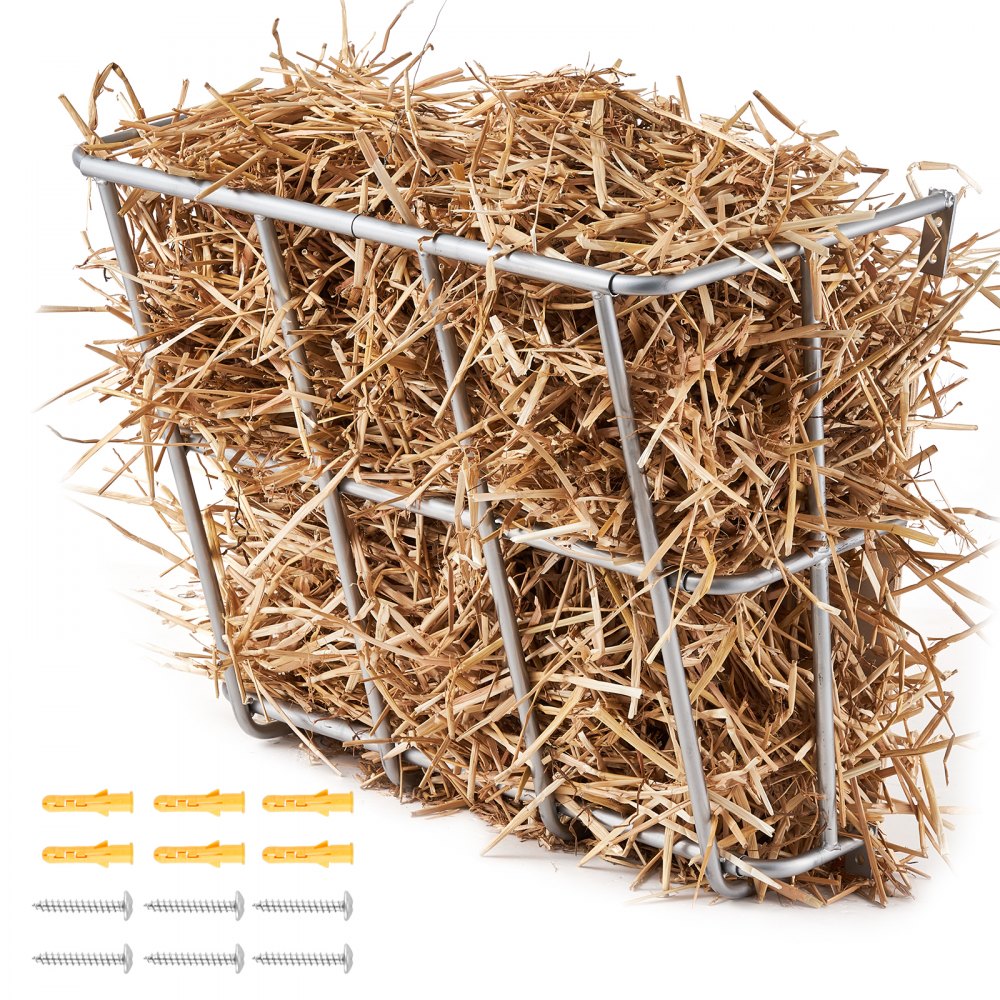 Wall mounted metal hay feeder with hay and mounting screws for horses and goats
