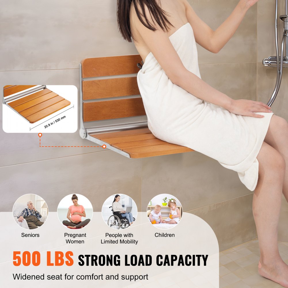 A woman sits on a wall-mounted teak shower seat with a 500 lbs capacity.