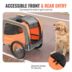Orange and gray dog bike trailer with accessible front and rear entries, shown with a golden retriever.