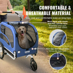 Blue and black dog bike trailer with mesh sides and a golden retriever inside.