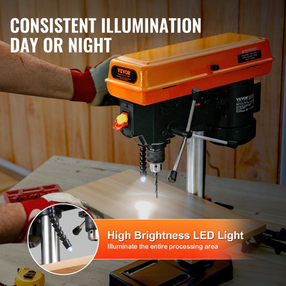 Orange Bostome 8-inch benchtop drill press with adjustable speed, LED light illuminating the drill bit on a wooden table.