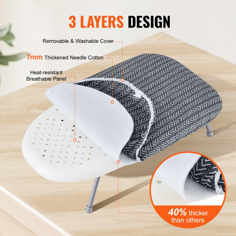 Compact tabletop ironing board with heat-resistant cover and foldable design for easy storage.