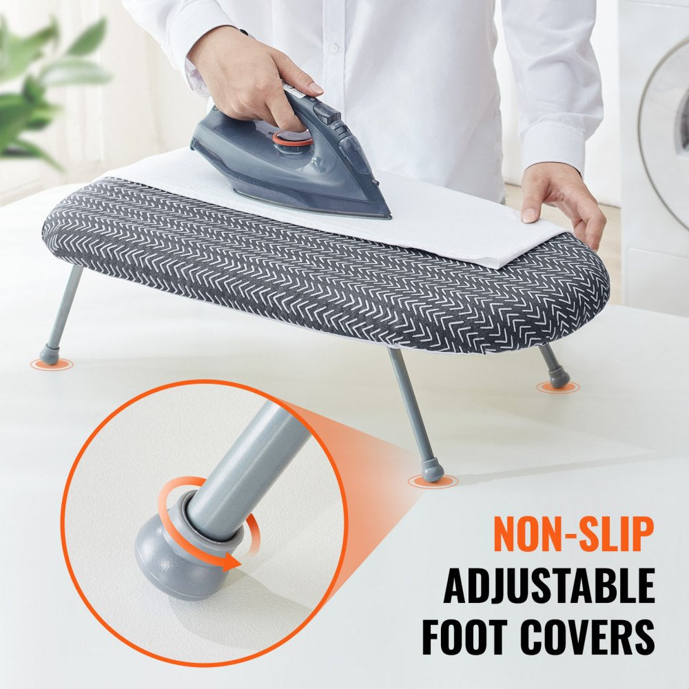 Compact tabletop ironing board with heat-resistant cover and foldable design for easy storage.
