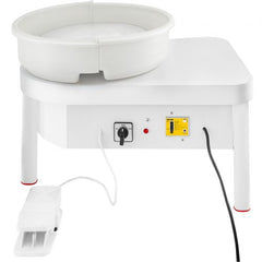 White 14-inch electric pottery wheel with foot pedal and control panel on a sturdy base.
