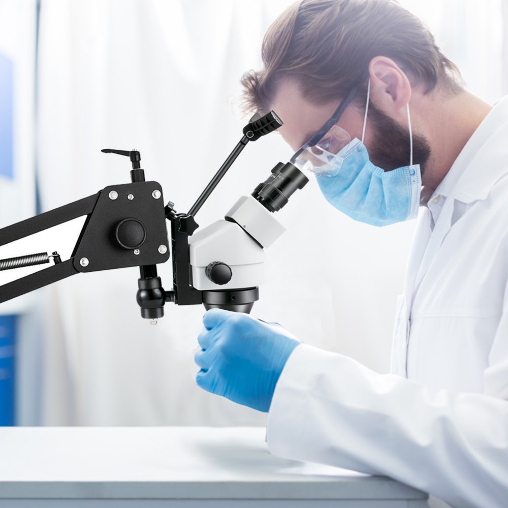 Bostome 7X-45X jewelry microscope with spring bracket for detailed gem setting and ergonomic use.