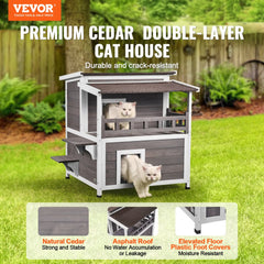 Two-story wooden cat house with a balcony, designed for outdoor feral cats.