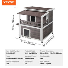 Two-story wooden cat house with a balcony, designed for outdoor feral cats.