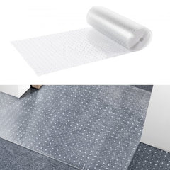 Transparent PVC carpet protector with textured studs for doorways and high-traffic areas.