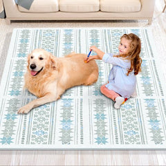 Colorful interlocking foam tiles create a soft play area for kids, featuring edge protectors.