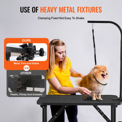 Foldable pet grooming table with metal clamp arm, shown stable with a woman grooming a small dog.