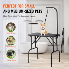 Foldable pet grooming table with clamp arm, suitable for small to medium dogs.