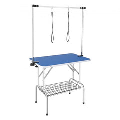 Foldable pet grooming table with dual arms, clamp, and waterproof blue tabletop.
