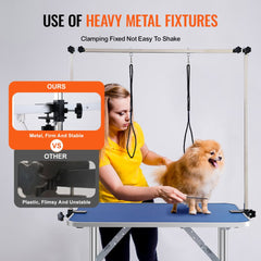 Bostome foldable pet grooming table with dual arms, clamp, and waterproof blue tabletop.