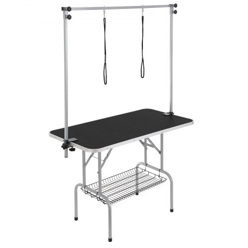 A 46-inch foldable pet grooming table in black with silver frame, two adjustable arms, and under-table shelf.