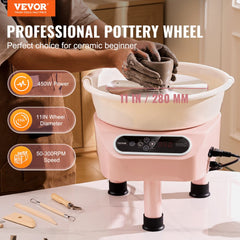 Pink 11-inch pottery wheel with 450W motor, foot pedal, and LCD display on a table with tools.