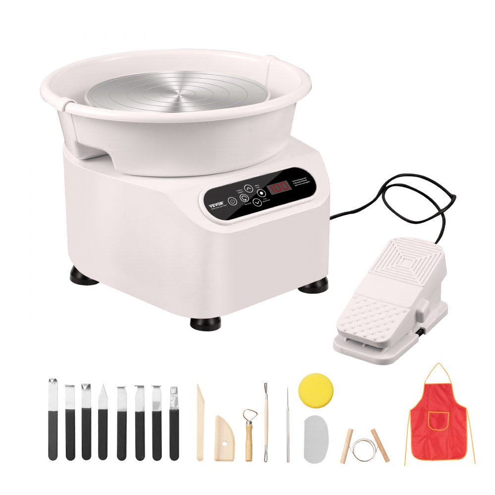 White 11-inch electric pottery wheel with 450W motor, foot pedal, LCD panel, and 17-piece tool kit including red apron.